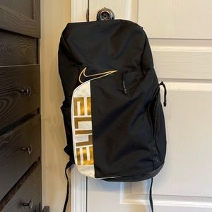 Black and gold Nike elite backpack